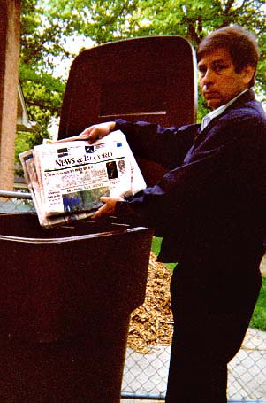 David-Dad Recycling Newspapers