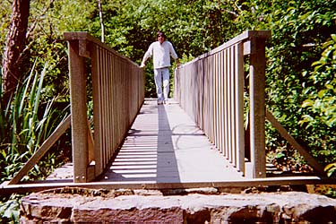 Meghan-Dad Walking Across Recycled Bridge